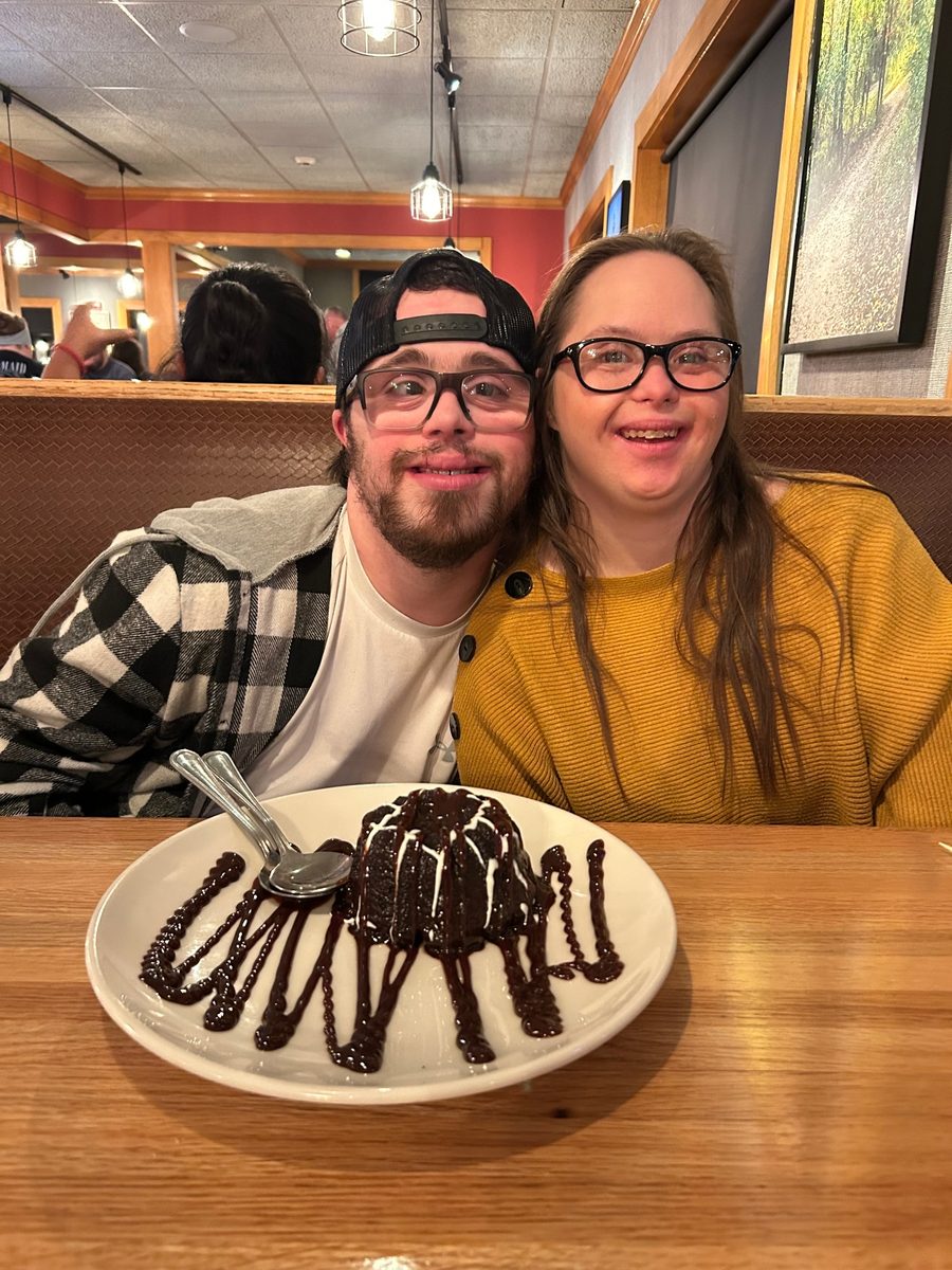 Matthew and Angela sharing a chocolate dessert