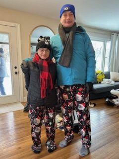 Dom and Nastia in holiday pajamas