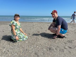 Dom and Nastia on the beach