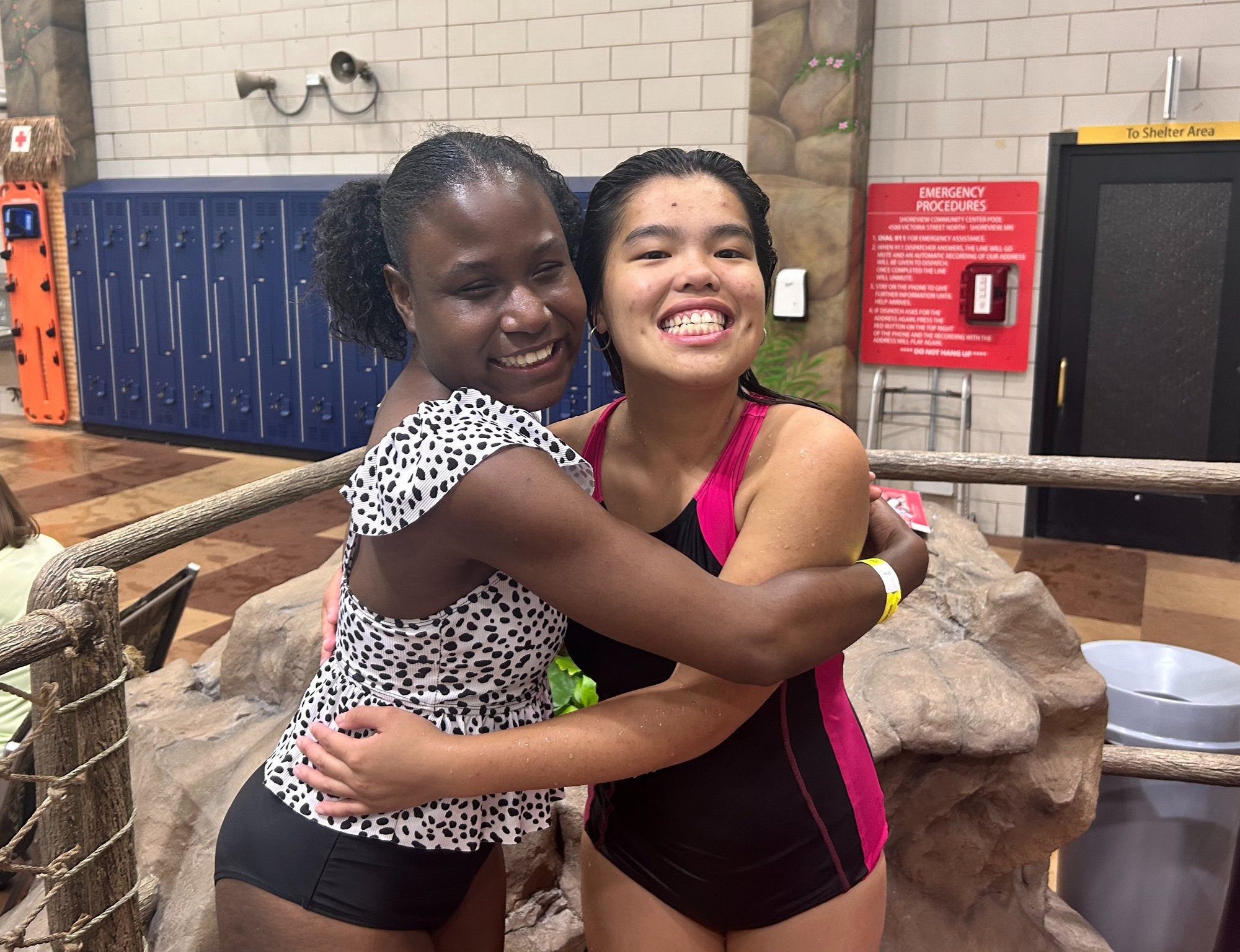 Rowan and Allise hugging — two friends matched through Find Love Safely