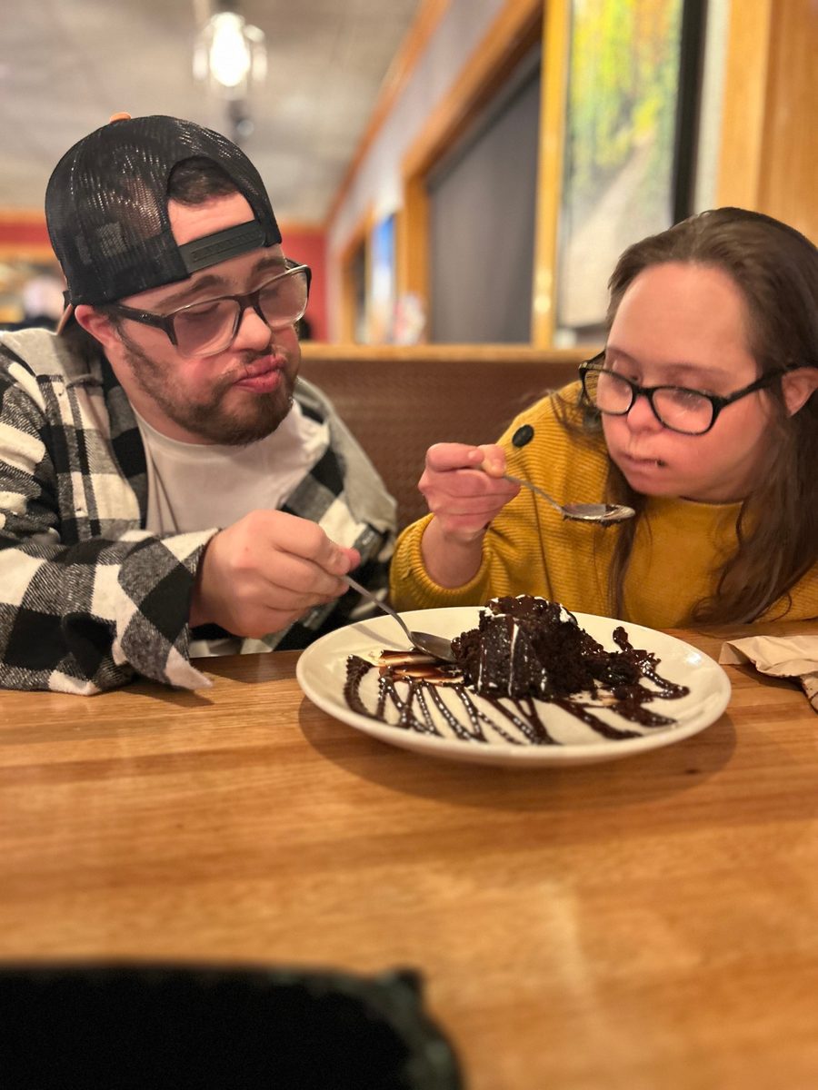 Matthew and Angela enjoying dessert together
